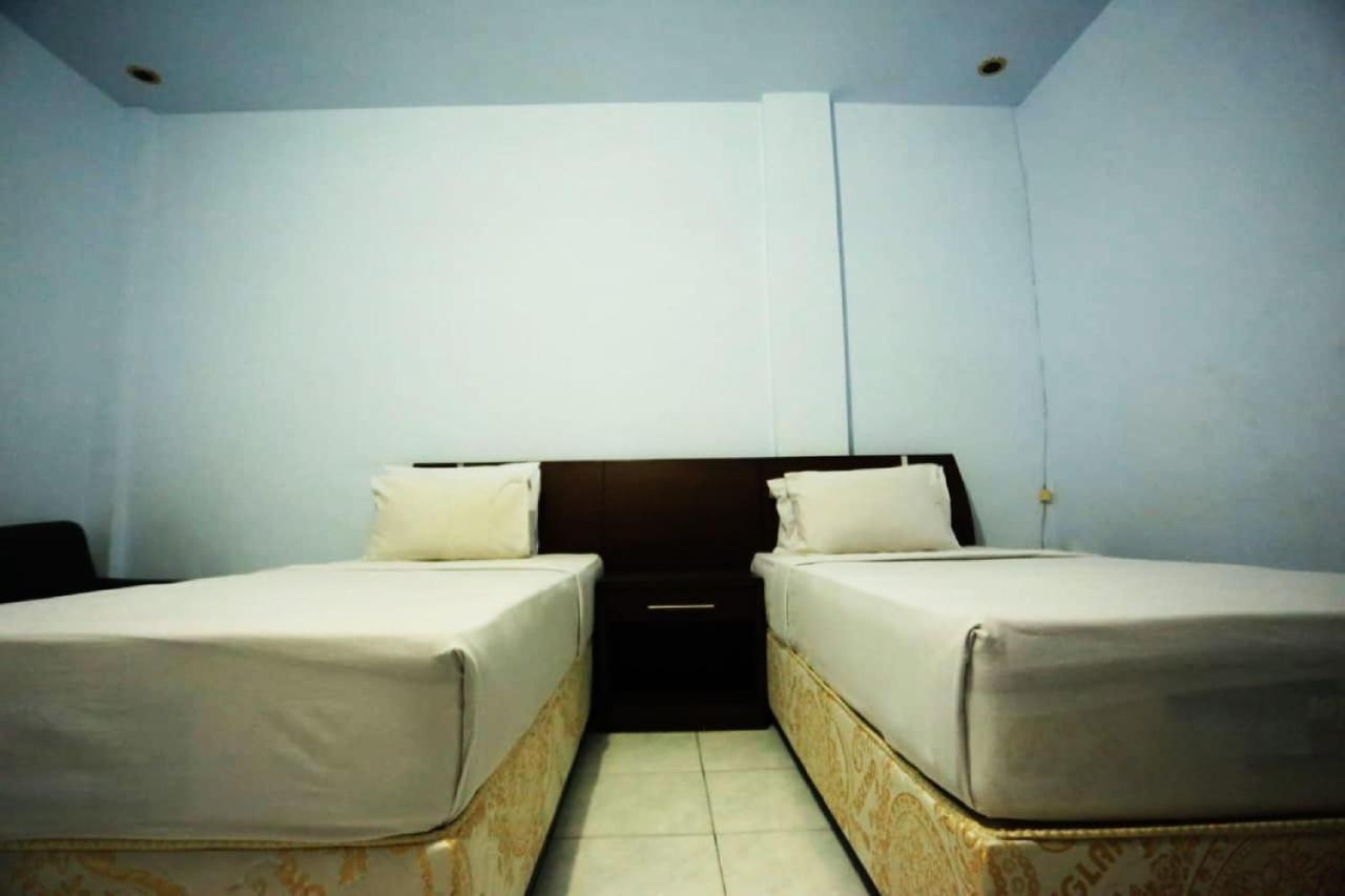 Urbanview Hotel Mulia Indah Palopo מראה חיצוני תמונה